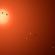 Imagen: Concepto de los 7 planetas similares a la Tierra que se encuentran en la órbita de TRAPPIST-1 (vía NASA).